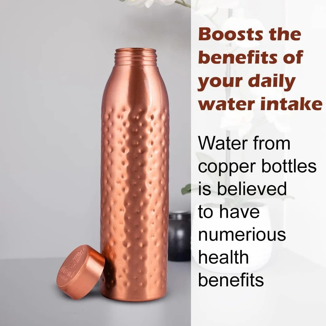 NORMAN JR Botella de agua de cobre de 1L–Caja de regalo (1 unidad),acabado martillado–Un recipiente ayurvédico de cobre puro–Te ayuda a beber más agua,ofreciendo numerosos beneficios para la salud.