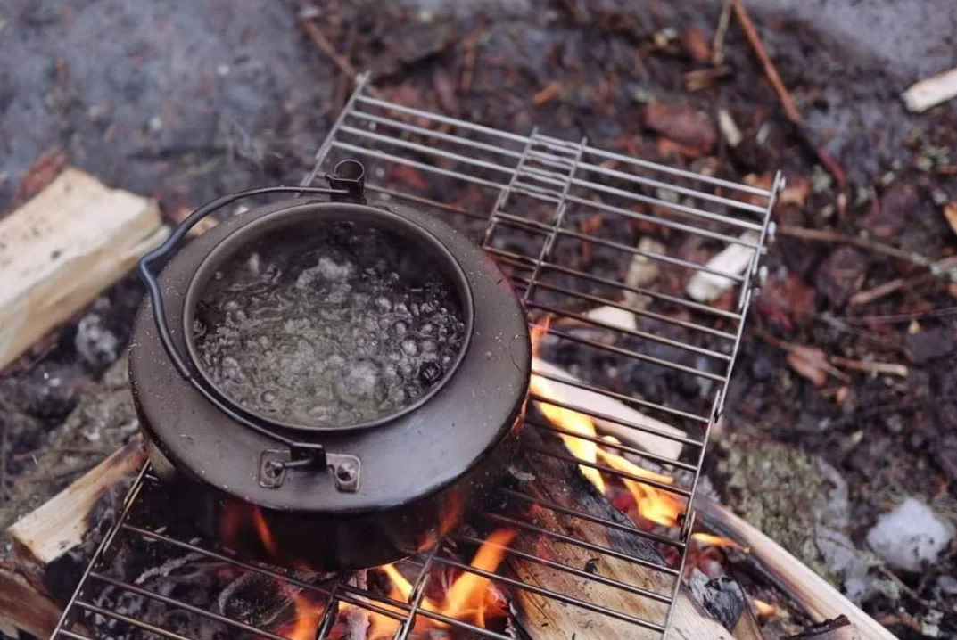 Parrilla de campamento ligera y potable de acero inoxidable 316 ultra compacta