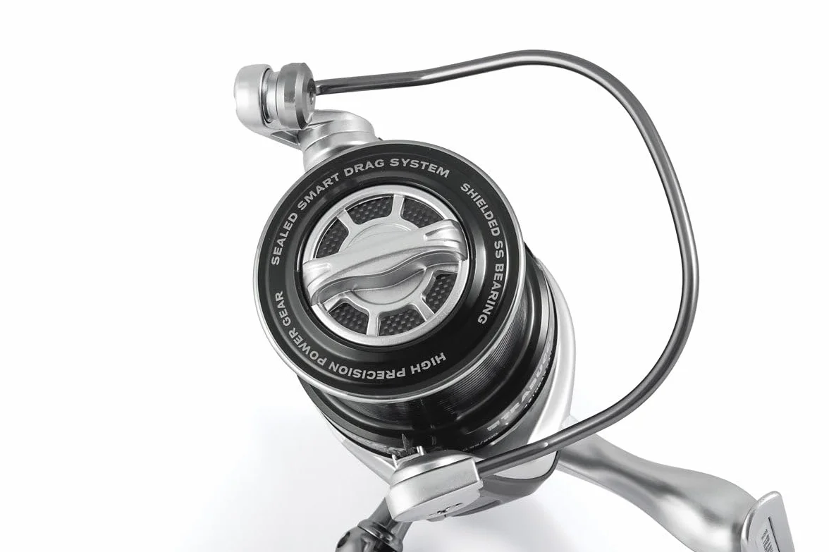 TRABUCCO Carrete LANCER LTX SURF 6500 art. 035-13-100, cuerpo y rotor ultraligeros de carbono, gris