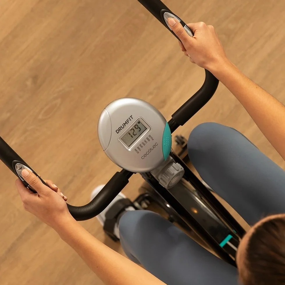 Cecotec Bicicleta estática plegable DrumFit X-Bike Neo, Sillín y manillar lateral, Sistema de plegado fácil y compacto, Soporte para dispositivos, 8 niveles de resistencia, 1,5 Kg volante de inercia.