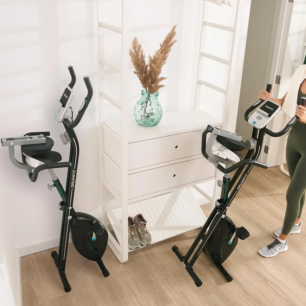 Cecotec Bicicleta Estática Plegable DrumFit X-Bike Neo Ultra. Sillín Confort con Respaldo, Volante de Inercia 1,5kg, 8 Niveles, Plegado Fácil y Compacto, Pantalla LCD, Soporte Dispositivos, Pulsómetro
