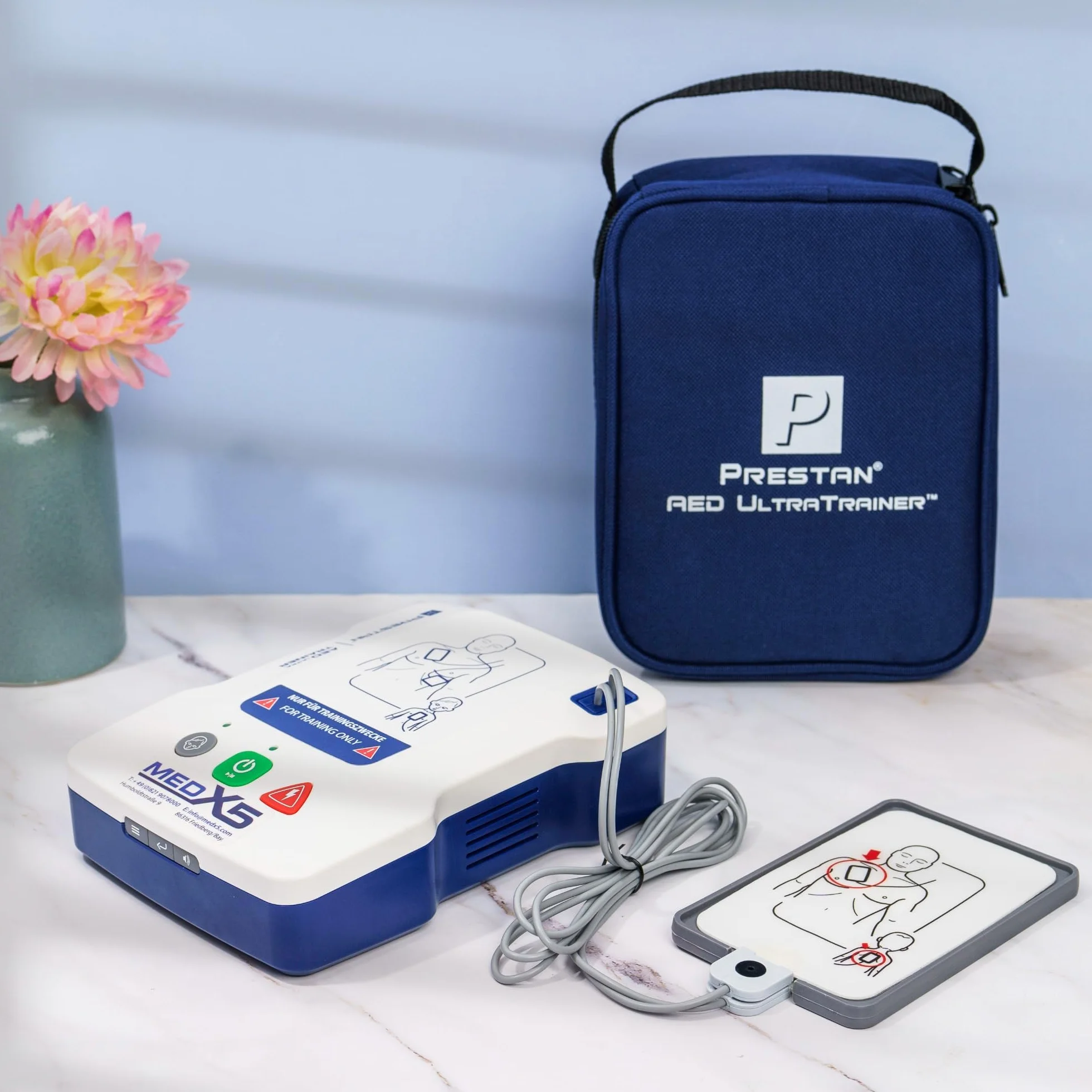 MedX5 Universal AED/defibrilador UltraTrainer, alemán/inglés, 3 años garantía